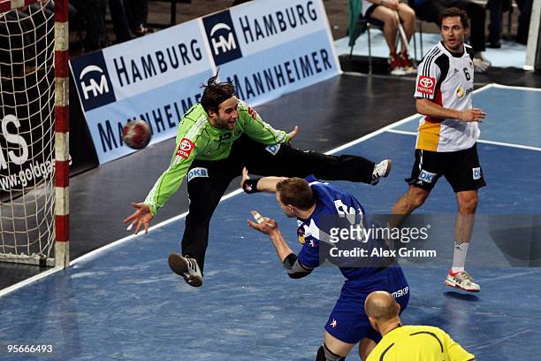 Vignir Svavarsson of Iceland scores a goal against goalkeeper Silvio Heinevetter of Germany during the international handball friendly match between...