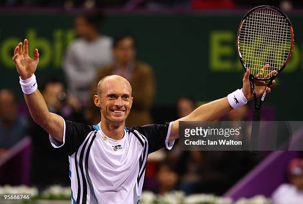 Nikolay Davydenko of Russia celebrates victory over Rafael Nadal of Spain during the Final match of the ATP Qatar ExxonMobil Open at the Khalifa...