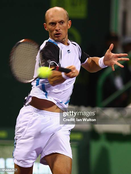 Nikolay Davydenko of Russia in action against Rafael Nadal of Spain during the Final match of the ATP Qatar ExxonMobil Open at the Khalifa...