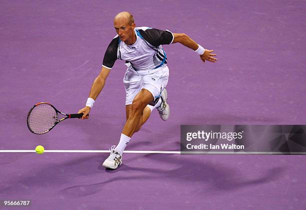 Nikolay Davydenko of Russia in action against Rafael Nadal of Spain during the Final match of the ATP Qatar ExxonMobil Open at the Khalifa...