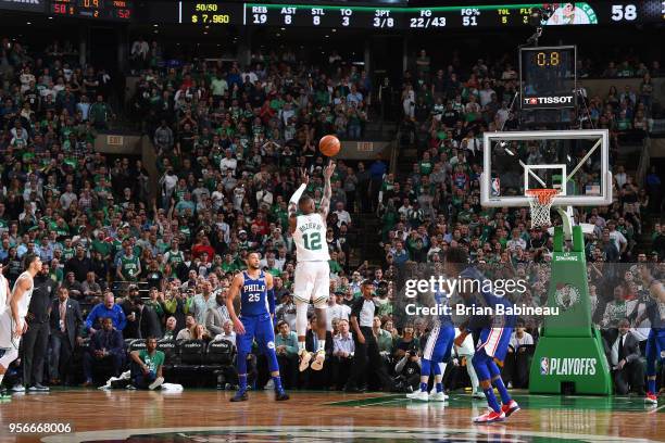 Terry Rozier of the Boston Celtics shoots a buzzer beater to end the first half against the Philadelphia 76ers in Game Five of the Eastern Conference...