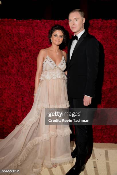 Stuart Vevers and Selena Gomez attend the Heavenly Bodies: Fashion & The Catholic Imagination Costume Institute Gala at The Metropolitan Museum of...