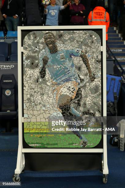 Mosaic in honour of Yaya Toure of Manchester City is seen pitch side during the Premier League match between Manchester City and Brighton and Hove...