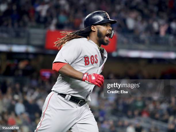 Hanley Ramirez of the Boston Red Sox reacts to his two run home run in the seventh inning against the New York Yankees at Yankee Stadium on May 9,...