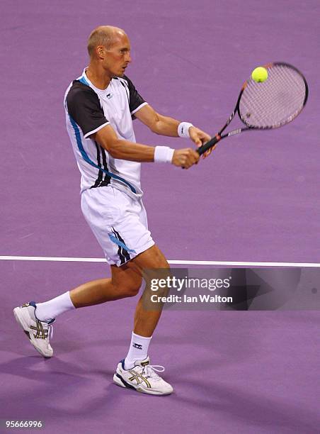 Nikolay Davydenko of Russia in action against Rafael Nadal of Spain during the Final match of the ATP Qatar ExxonMobil Open at the Khalifa...