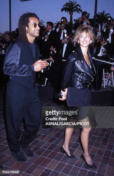 Yannick Noah et Dalila Di Lazzaro au Festival de Cannes en mai 1992, France.