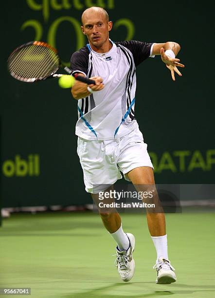 Nikolay Davydenko of Russia in action against Rafael Nadal of Spain during the Final match of the ATP Qatar ExxonMobil Open at the Khalifa...