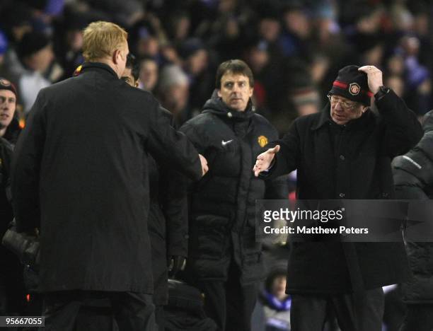 Sir Alex Ferguson of Manchester United shakes hands with Alex McLeish of Birmingham City after the FA Barclays Premier League match between...