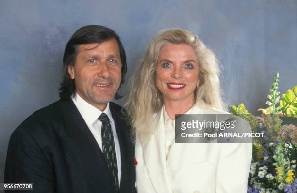 Portrait de Ilie N?stase et sa femme au tournoi de tennis de Roland Garros le 3 juin 1994, Paris, France.