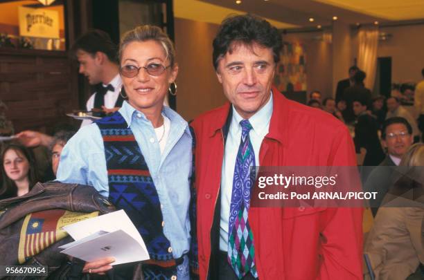 Sheila et Sacha Distel au tournoi de tennis de Roland Garros en juin 1995, Paris, France.