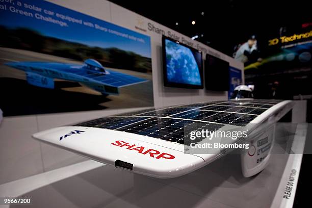 The Tokai Challenger, a solar car equipped with Sharp Corp. Compound solar cells, sits on display during the 2010 International Consumer Electronics...