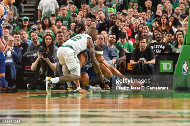 Terry Rozier of the Boston Celtics and Justin Anderson of the Philadelphia 76ers go after the loose ball during Game Five of the Eastern Conference...