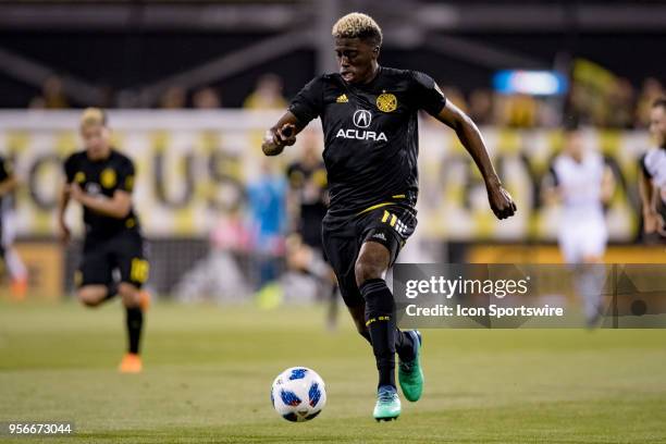 Columbus Crew forward Gyasi Zerdes pushes the ball past midfield in the MLS regular season game between the Columbus Crew SC and the Philadelphia...