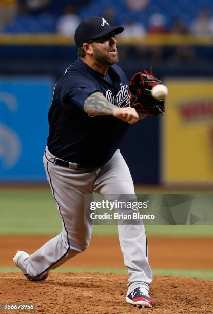 Pitcher Peter Moylan of the Atlanta Braves pitches during the eighth inning of a game against the Tampa Bay Rays on May 9, 2018 at Tropicana Field in...