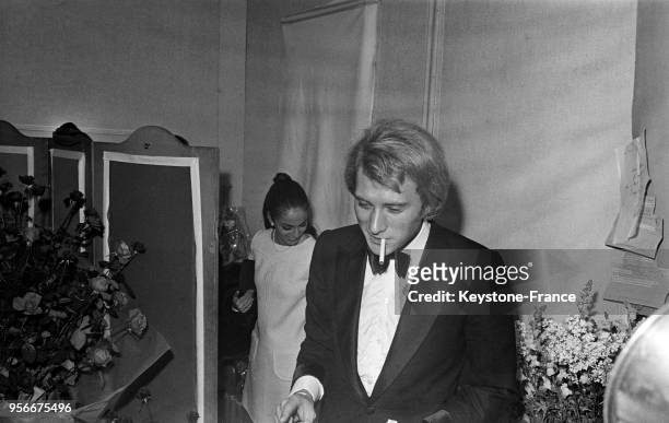 Johnny Hallyday venu assister au concert de Sylvie Vartan à l'Olympia, à Paris, France le 4 décembre 1968.