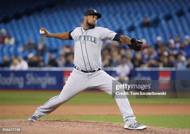 Juan Nicasio of the Seattle Mariners delivers a pitch in the eighth inning during MLB game action against the Toronto Blue Jays at Rogers Centre on...