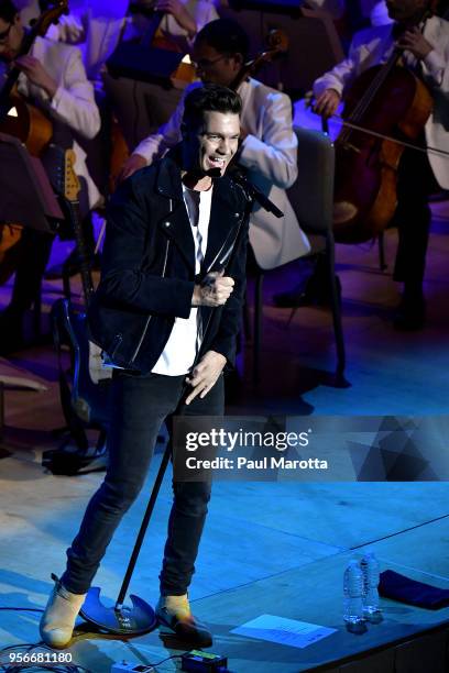 Andy Grammer performs with the Boston Pops Orchestra led by Conductor Keith Lockhart at the orchestra's opening night concert on May 9, 2018 in...