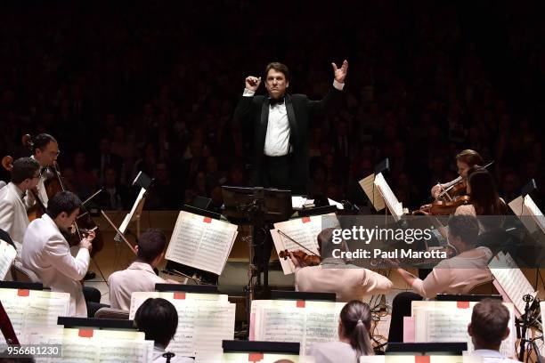 Conductor Keith Lockhart leads the Boston Pops Orchestra in a Leonard Bernstein Centennial Tribute for the orchestra's opening night concert on May...