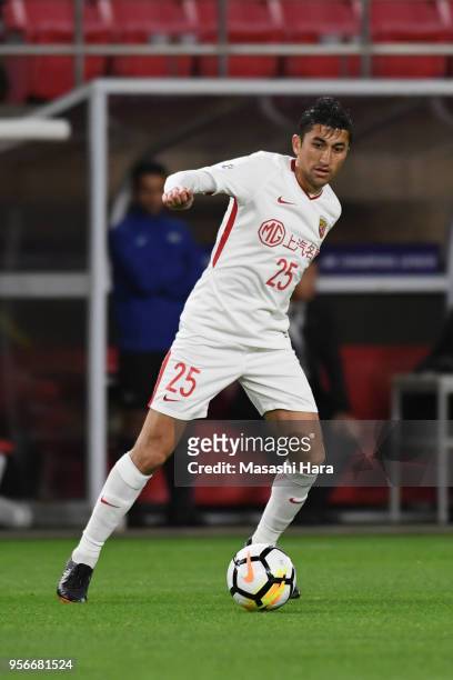 Odil Ahmedov of Shanghai SIPG in action during the AFC Champions League Round of 16 first leg match between Kashima Antlers and Shanghai SIPG at...