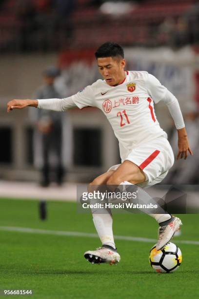 Yu Hai of Shanghai SIPG in action during the AFC Champions League Round of 16 first leg match between Kashima Antlers and Shanghai SIPG at Kashima...