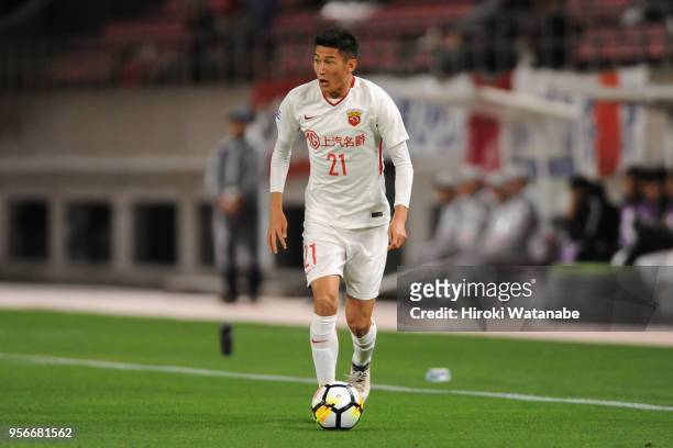 Yu Hai of Shanghai SIPG in action during the AFC Champions League Round of 16 first leg match between Kashima Antlers and Shanghai SIPG at Kashima...
