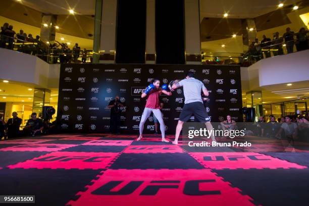 Women's bantamweight champion contender Amanda Nunes of Brazil holds an open training session at Barra Shopping Mall on May 9, 2018 in Rio de...