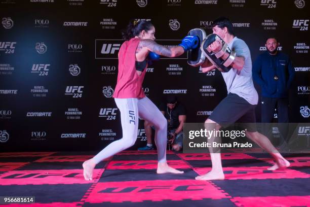 Women's bantamweight champion contender Amanda Nunes of Brazil holds an open training session at Barra Shopping Mall on May 9, 2018 in Rio de...