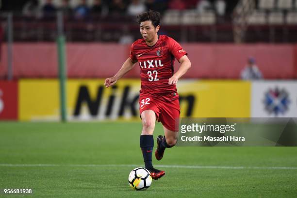 Koki Anzai of Kashima Antlers in action during the AFC Champions League Round of 16 first leg match between Kashima Antlers and Shanghai SIPG at...