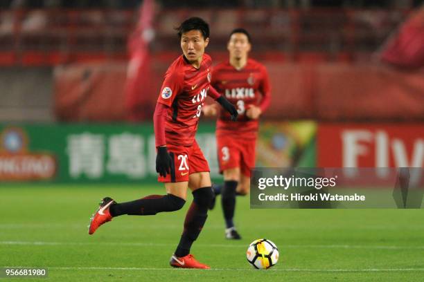 Kento Misao of Kashima Antlers in action during the AFC Champions League Round of 16 first leg match between Kashima Antlers and Shanghai SIPG at...