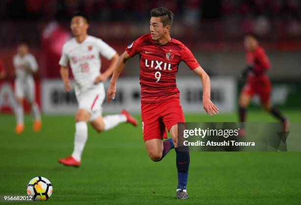 Yuma Suzuki of Kashima Antlers in action during the AFC Champions League Round of 16 first leg match between Kashima Antlers and Shanghai SIPG at...