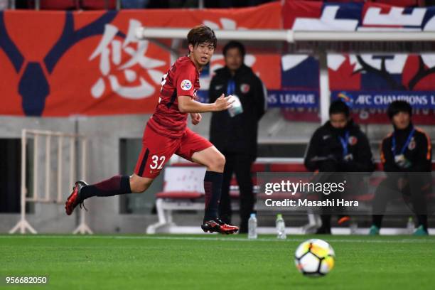 Koki Anzai of Kashima Antlers in action during the AFC Champions League Round of 16 first leg match between Kashima Antlers and Shanghai SIPG at...