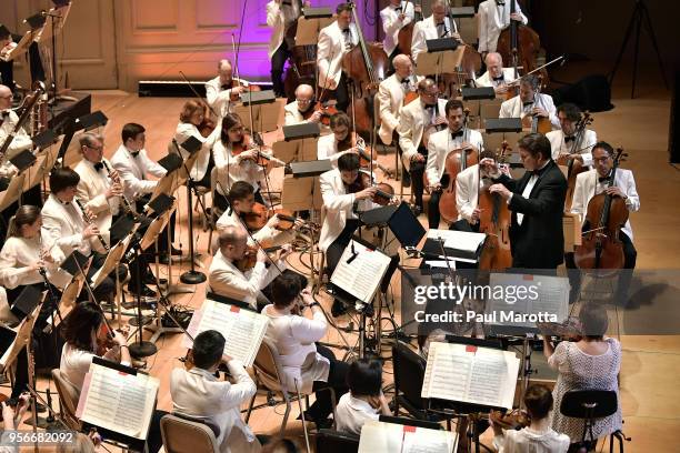 Conductor Keith Lockhart leads the Boston Pops Orchestra in a Leonard Bernstein Centennial Tribute for the orchestra's opening night concert on May...