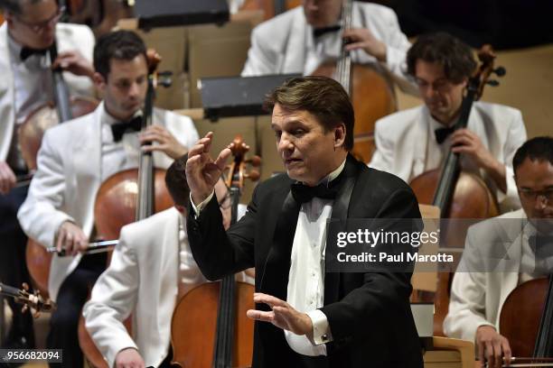 Conductor Keith Lockhart leads the Boston Pops Orchestra in a Leonard Bernstein Centennial Tribute for the orchestra's opening night concert on May...