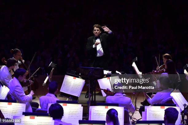 Conductor Keith Lockhart leads the Boston Pops Orchestra in a Leonard Bernstein Centennial Tribute for the orchestra's opening night concert on May...