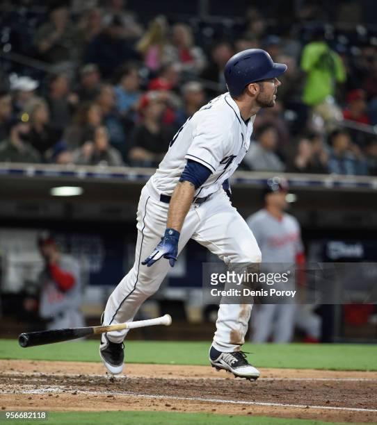 Matt Szczur of the San Diego Padres hits an RBI double during the seventh inning of a baseball game against the Washington Nationals at PETCO Park on...