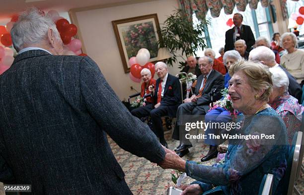 Senior couples at a senior living community renewing their vows on Valentine's Day. Captain Rich Simon of the Spirit of Washington Cruises...