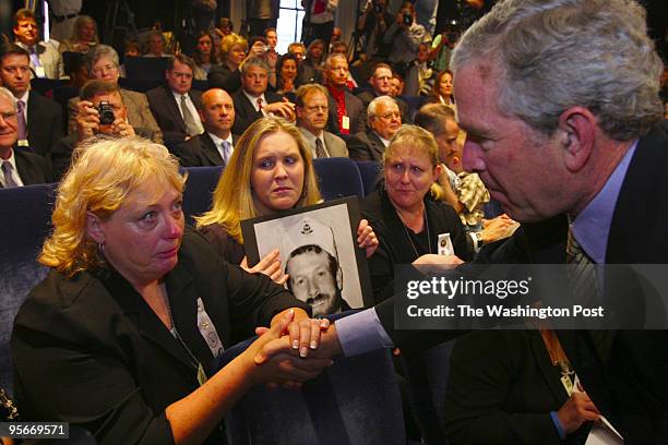 President Bush signed S 2803, the MINER Act in the EEOB-Room 450. Family members affected by recent mine accidents and a surviving miner from...