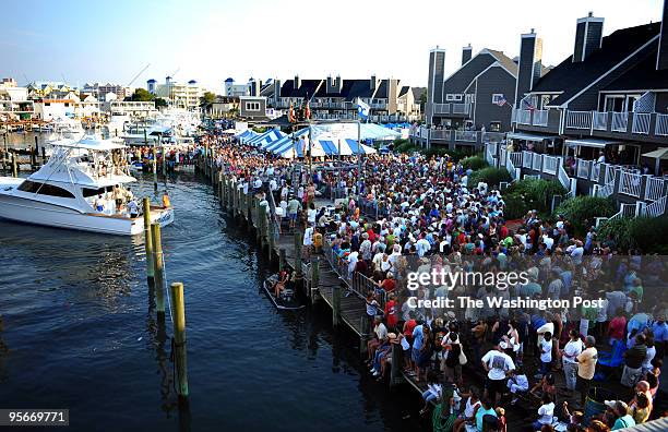 During the White Marlin Open fishing tournament in Ocean City, Md., the official weigh-ins take place at Harbour Island on 14th street. The party...