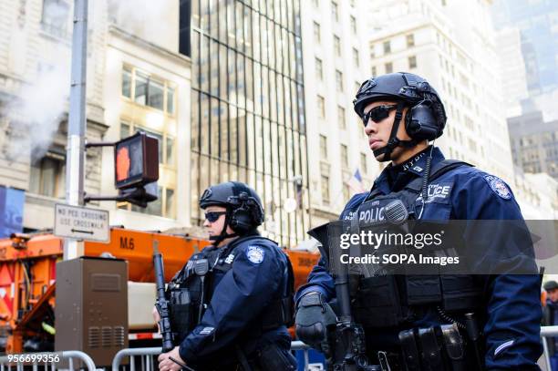 Heavily-armed police keep watch in Midtown Manhattan on Election Day. Both Donald Trump and Hillary Clinton are due to hold election night events in...