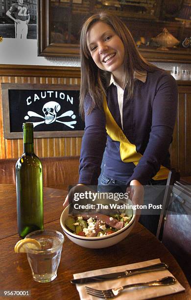 For the online folks we photograph Rugby Restaurant server Stephanie Simoni as she serves a Roast Beef Salad.