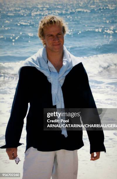 Christophe Lambert sur une plage le 10 mai 1997, France.