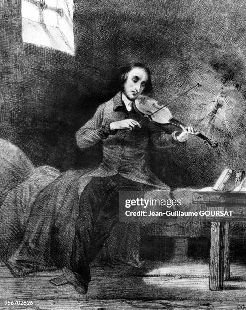 Le violoniste italien Niccolo Paganini en prison, jouant du violon dans sa cellule.