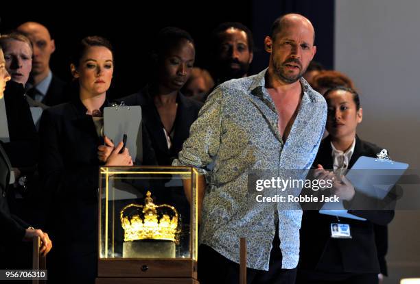 Stephane Degout as King with artists of the company in the Royal Opera's production of Martin Crimp's Lessons in Love and Violence directed by Katie...