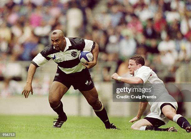 Jonah Lomu of Barbarians in action during the Scottish Amicable Tour Match between England and The Barbarians played at Twickenham in London....