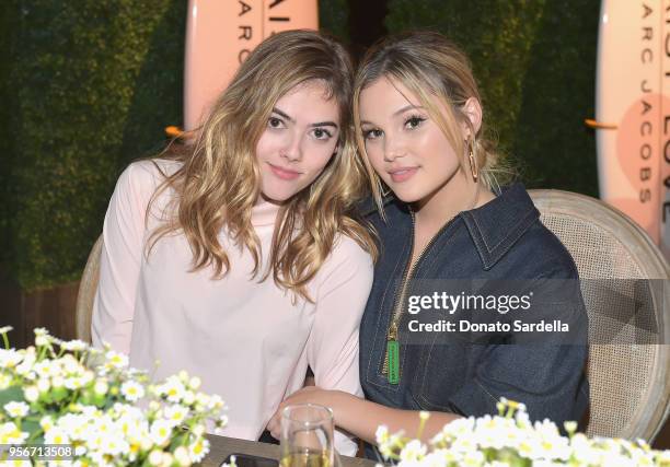 McKaley Miller and Olivia Holt attend the Marc Jacobs Fragrances Celebrates the Launch of DAISY LOVE on May 9, 2018 in Los Angeles, California.