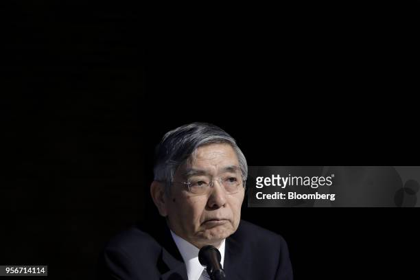 Haruhiko Kuroda, governor of the Bank of Japan , listens during an event in Tokyo, Japan, on Thursday, May 10, 2018. A summary of opinions from BOJ...