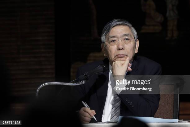 Haruhiko Kuroda, governor of the Bank of Japan , listens during an event in Tokyo, Japan, on Thursday, May 10, 2018. A summary of opinions from BOJ...