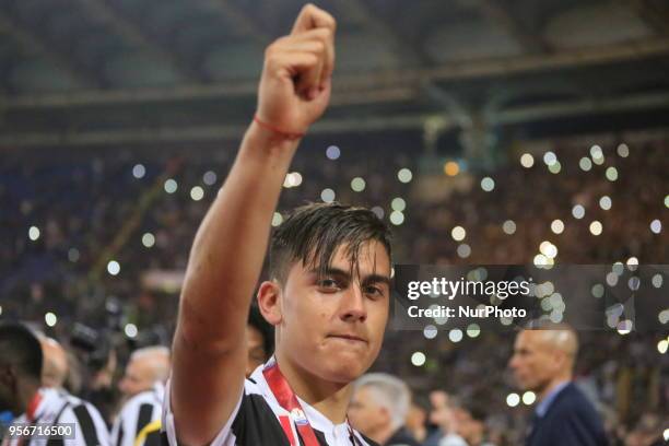 Paulo Dybala celebrates the Italian Cup win after the final match against Milan at Stadio Olimpico on May 09, 2018 in Rome, Italy. Juventus won 4-0...