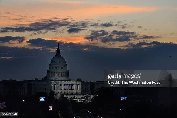 The sun rises over the U.S. Capitol in Washington, D.C., hours before President-elect Barack Obama gets ready to take the oath of office on...