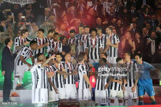Juventus players celebrate the Italian Cup win after the final match against Milan at Stadio Olimpico on May 09, 2018 in Rome, Italy. Juventus won...